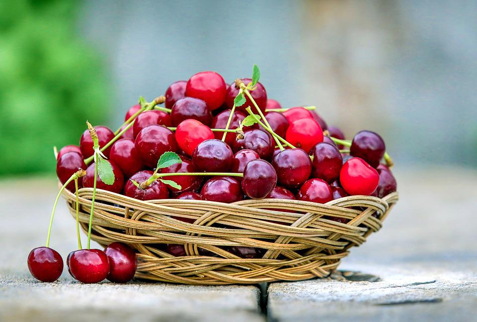 A Basket with Cherries